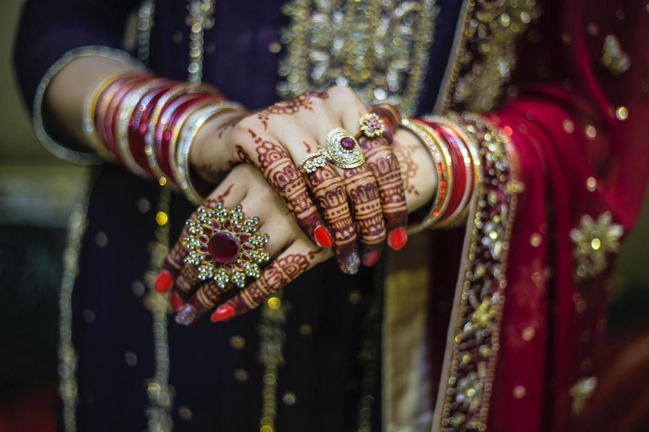 Novotel Chennai Sipcot Exteriör bild A bride with henna on her hands