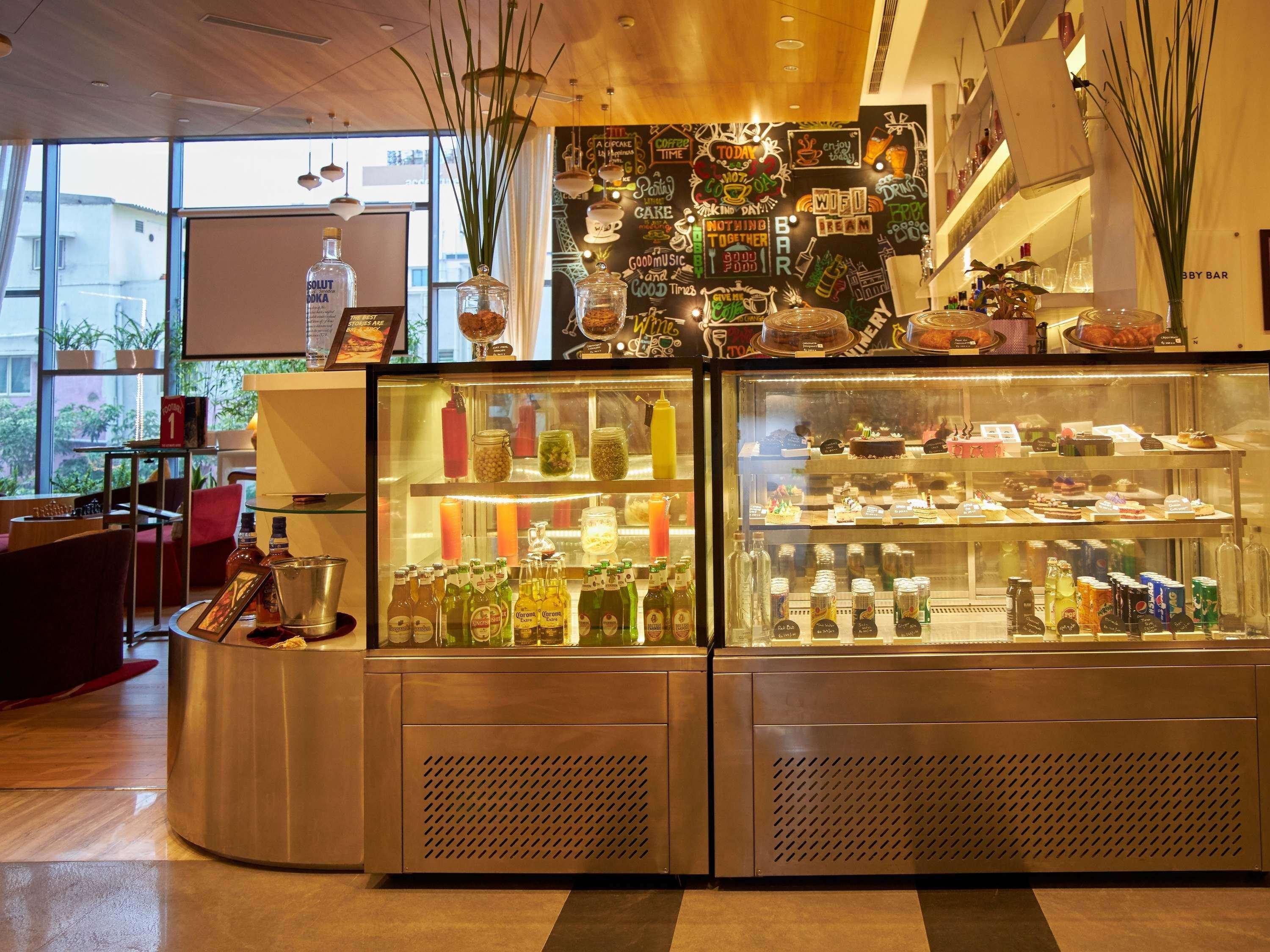 Novotel Chennai Sipcot Exteriör bild The pastry counter at the lobby